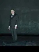 A man alone on a stage                                                                                     